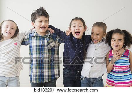 Stock Photo - Children hugging. Fotosearch