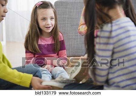 Children talking in living room View Large Photo Image Stock Photo - Children talking in living room. Fotosearch