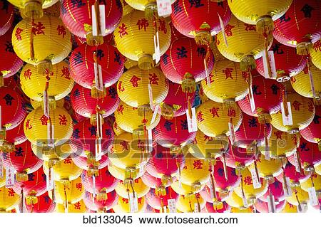 Stock Photography - Chinese New Year lanterns hanging from ceiling. Fotosearch