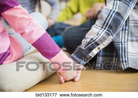 Close up of children holding hands View Large Photo Image Stock Photo - Close up of children holding hands. Fotosearch