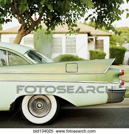 Stock Photography - Close up of fins on classic car. Fotosearch