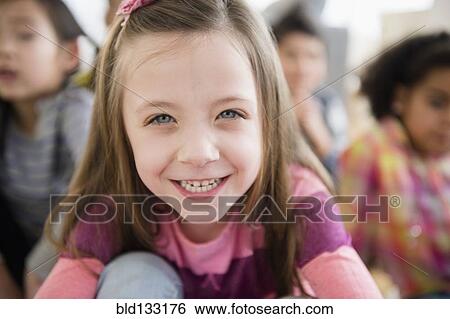 Close up of girl smiling View Large Photo Image Stock Photograph - Close up of girl smiling. Fotosearch