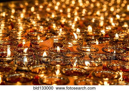Close up of lit candles with wish notes View Large Photo Image Stock Image - Close up of lit candles with wish notes. Fotosearch