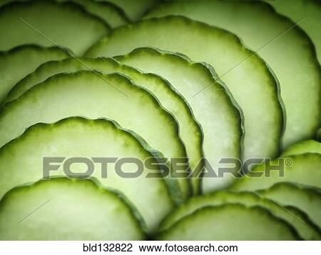 Stock Image - Close up of sliced fruit. Fotosearch