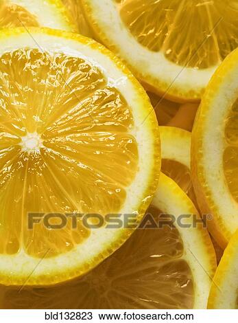 Stock Image - Close up of sliced fruit. Fotosearch
