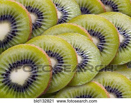 Close up of sliced kiwi fruit View Large Photo Image Stock Image - Close up of sliced kiwi fruit. Fotosearch