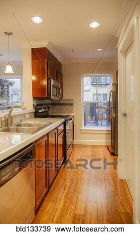 Stock Photo - Countertops and sink in modern kitchen. Fotosearch