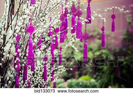 Decorations hanging from plants View Large Photo Image Stock Image - Decorations hanging from plants. Fotosearch