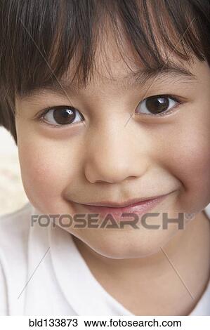 Filipino boy smiling View Large Photo Image Stock Image - Filipino boy smiling. Fotosearch