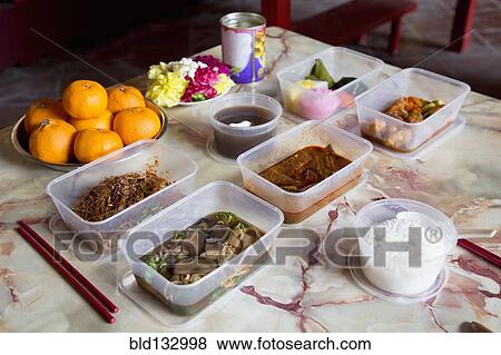 Food offerings in Buddhist temple for Chinese New Year View Large Photo Image Stock Photo - Food offerings in Buddhist temple for Chinese New Year. Fotosearch