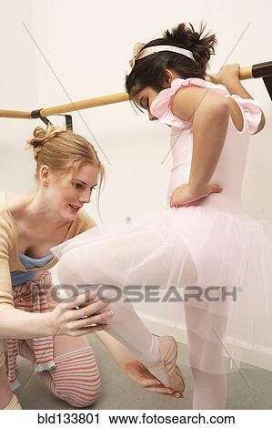 Girl working with ballet teacher View Large Photo Image Stock Image - Girl working with ballet teacher. Fotosearch