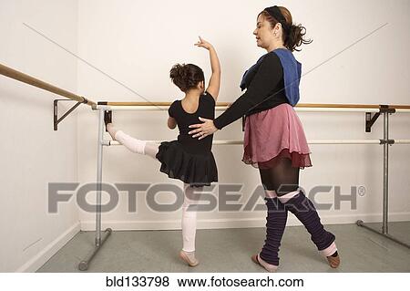 Girl working with ballet teacher View Large Photo Image Stock Photo - Girl working with ballet teacher. Fotosearch