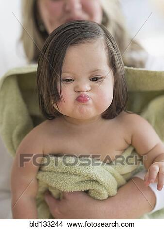 Hispanic toddler making faces after bath View Large Photo Image Picture - Hispanic toddler making faces after bath. Fotosearch