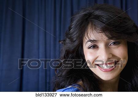 Stock Photo - Hispanic woman smiling. Fotosearch