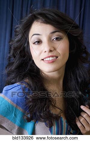 Hispanic woman smiling View Large Photo Image Stock Photograph - Hispanic woman smiling. Fotosearch