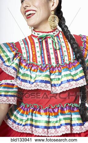 Stock Image - Hispanic woman wearing traditional clothing. Fotosearch