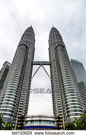 Low angle view of Petronas Twin Towers, Kuala Lumpur, Federal Territory of Kuala Lumpur, Malaysia View Large Photo Image Stock Photo - Low angle view of Petronas Twin Towers, Kuala Lumpur, Federal Territory of Kuala Lumpur, Malaysia. Fotosearch