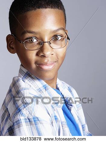 Stock Photo - Mixed race boy smiling. Fotosearch