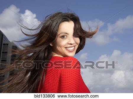 Mixed race woman smiling outdoors View Large Photo Image Stock Photograph - Mixed race woman smiling outdoors. Fotosearch