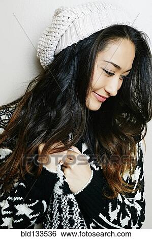 Stock Photograph - Mixed race woman smiling. Fotosearch