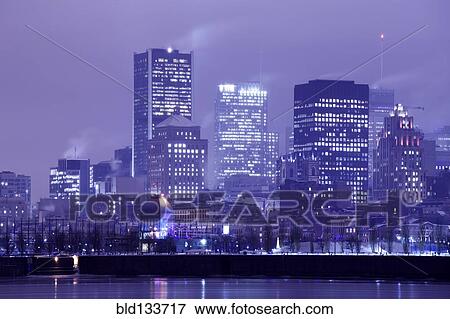 Montreal city skyline lit up at night, Quebec, Canada View Large Photo Image Stock Photo - Montreal city skyline lit up at night, Quebec, Canada. Fotosearch