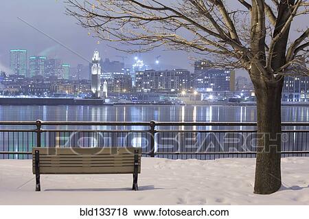 Stock Photo - Montreal city skyline lit up at night, Quebec, Canada. Fotosearch