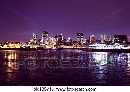 Stock Photography - Montreal city skyline lit up at night, Quebec, Canada. Fotosearch