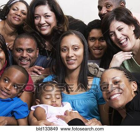 Stock Photo - Multi-generation family smiling together. Fotosearch