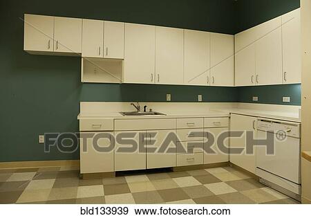Shelves and countertops in empty kitchen View Large Photo Image Stock Photo - Shelves and countertops in empty kitchen. Fotosearch
