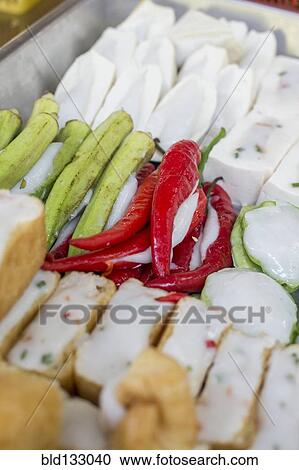 Tofu and vegetables for sale in market View Large Photo Image Stock Image - Tofu and vegetables for sale in market. Fotosearch