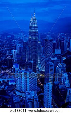 Stock Image - View of city skyline lit up at night, Kuala Lumpur, Malaysia. Fotosearch