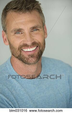 Stock Photograph - Caucasian man smiling. Fotosearch