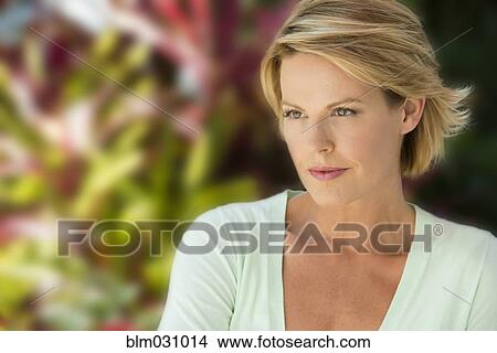 Picture - Caucasian woman outdoors. Fotosearch