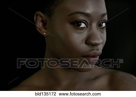 Black woman looking at camera View Large Photo Image Stock Image - Black woman looking at camera. Fotosearch