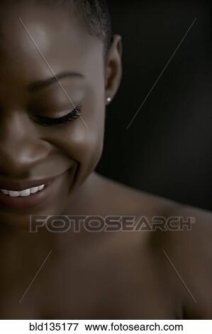 Stock Photo - Black woman smiling. Fotosearch