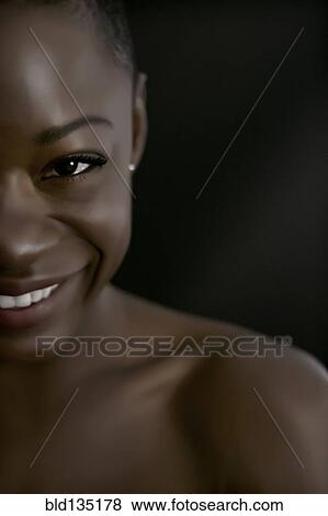 Stock Photo - Black woman smiling. Fotosearch