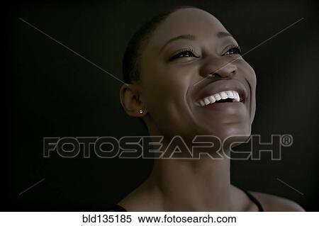 Stock Photography - Black woman smiling. Fotosearch