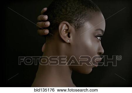 Black woman with hand behind head View Large Photo Image Stock Photograph - Black woman with hand behind head. Fotosearch