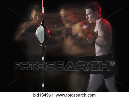 Blurred view of Caucasian boxer training View Large Photo Image Stock Photo - Blurred view of Caucasian boxer training. Fotosearch