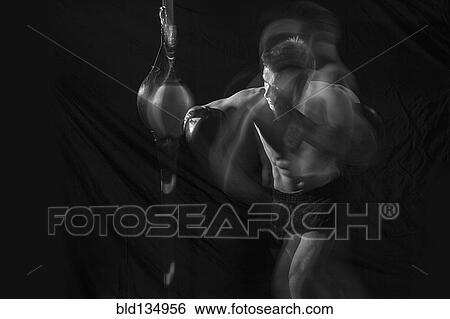 Blurred view of Caucasian boxer training View Large Photo Image Stock Photograph - Blurred view of Caucasian boxer training. Fotosearch