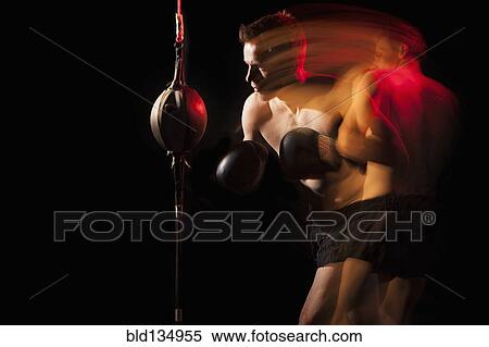 Blurred view of Caucasian boxer training View Large Photo Image Stock Photography - Blurred view of Caucasian boxer training. Fotosearch