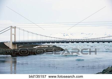 Bridge over arctic river View Large Photo Image Stock Photo - Bridge over arctic river. Fotosearch