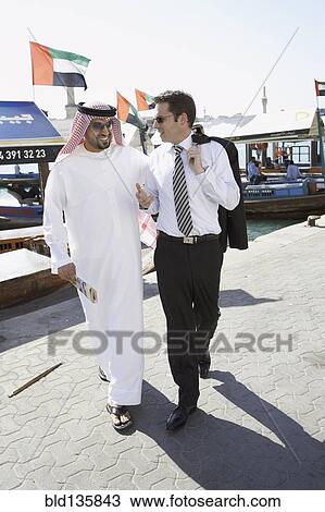 Businessmen talking on city street View Large Photo Image Stock Image - Businessmen talking on city street. Fotosearch
