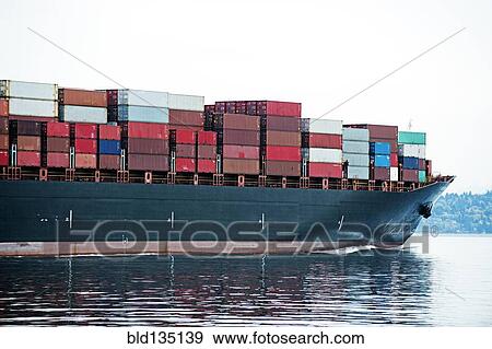 Cargo container ship on ocean View Large Photo Image Stock Photo - Cargo container ship on ocean. Fotosearch