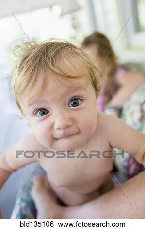 Caucasian baby grimacing View Large Photo Image Stock Photograph - Caucasian baby grimacing. Fotosearch