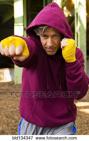 Caucasian boxer with fists raised View Large Photo Image Stock Photo - Caucasian boxer with fists raised. Fotosearch