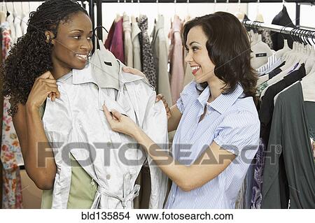 Caucasian dressmaker working with client View Large Photo Image Picture - Caucasian dressmaker working with client. Fotosearch