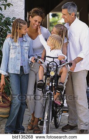 Caucasian family walking together View Large Photo Image Stock Photo - Caucasian family walking together. Fotosearch
