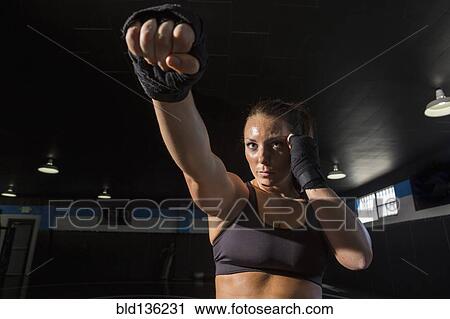 Caucasian fighter training in gym View Large Photo Image Stock Image - Caucasian fighter training in gym. Fotosearch