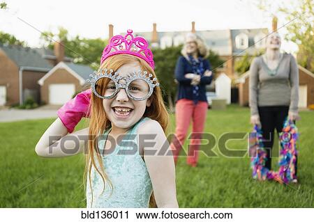 Caucasian girl playing dress up in park View Large Photo Image Stock Image - Caucasian girl playing dress up in park. Fotosearch